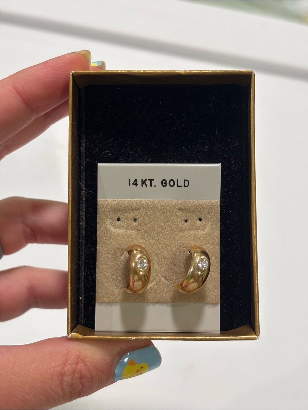 Gold-toned Huggie Earrings with Crystal Accent